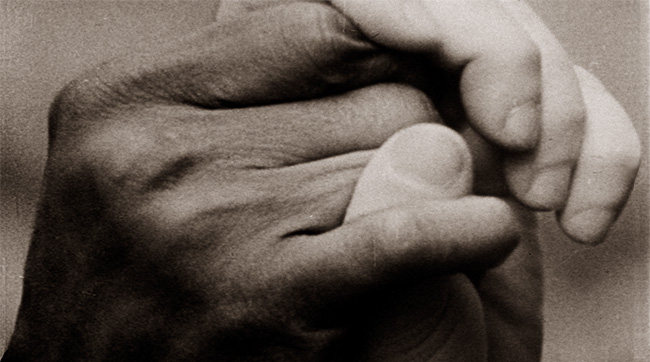 black and white hands interlocked martin luther king funeral